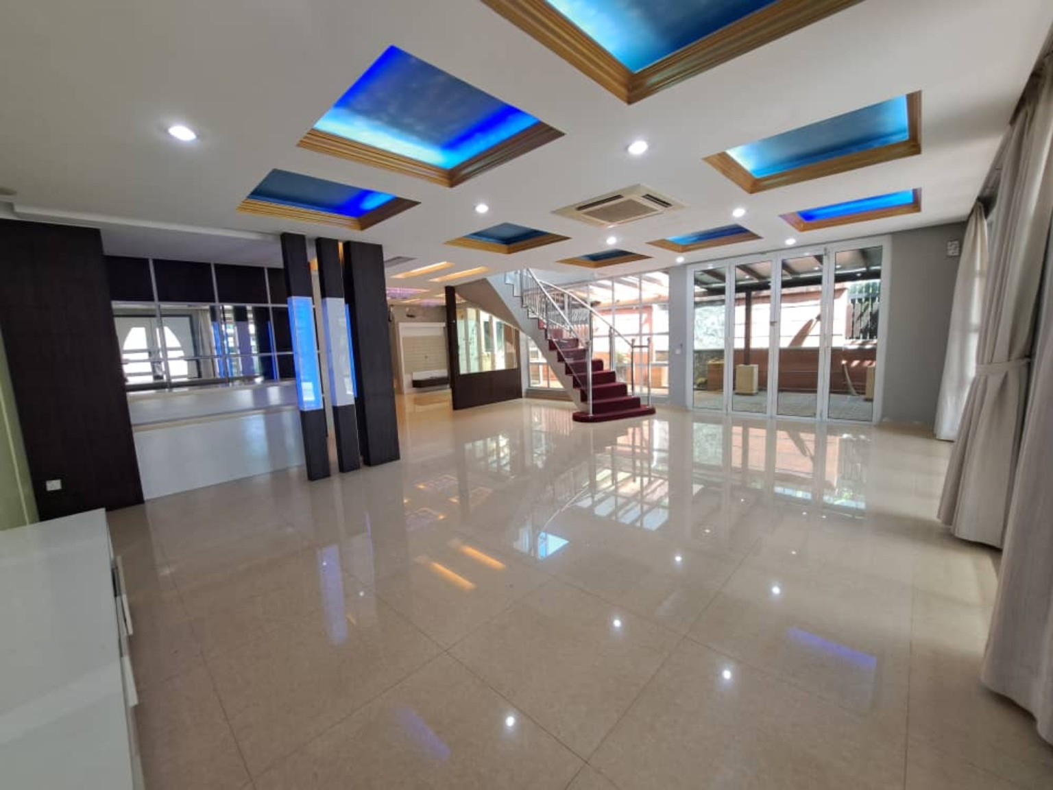 Open-plan living area and staircase